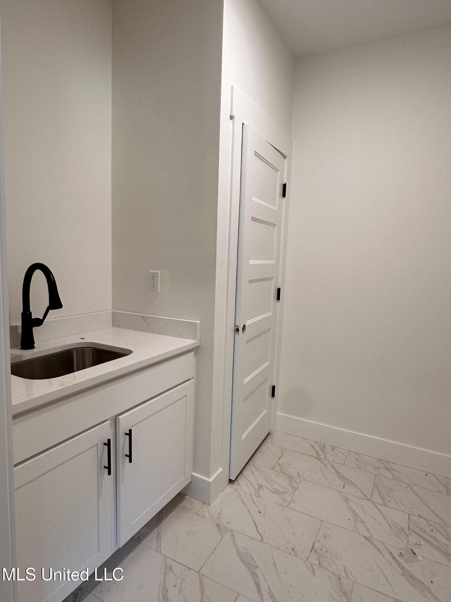 4391 Brooke Drive Nesbit, MS 38651 - Photo 23 of 27 Laundry Room