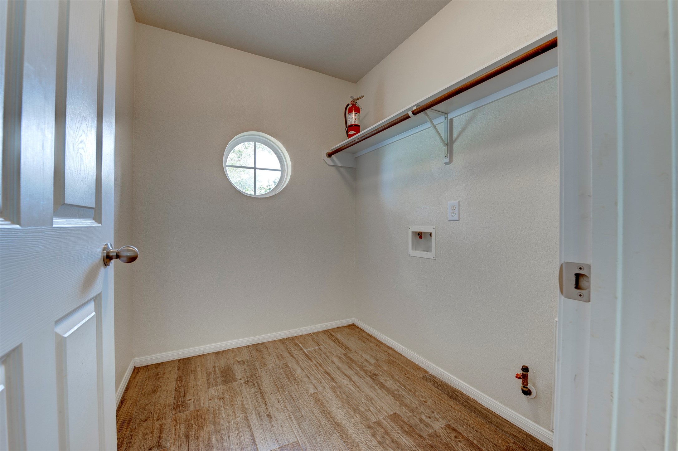 3314 Single Ridge Way Katy, TX 77493 - Photo 22 of 24 Laundry room with hanging rack