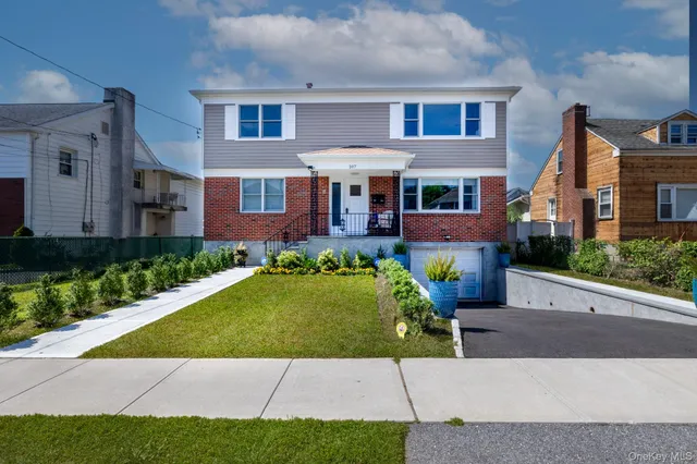 a front view of house with yard