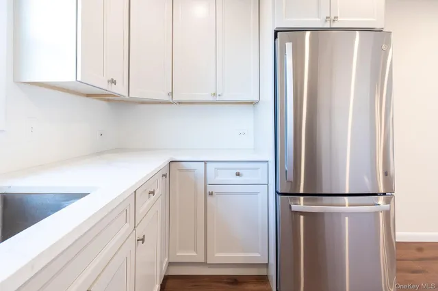 a kitchen with appliances and cabinets