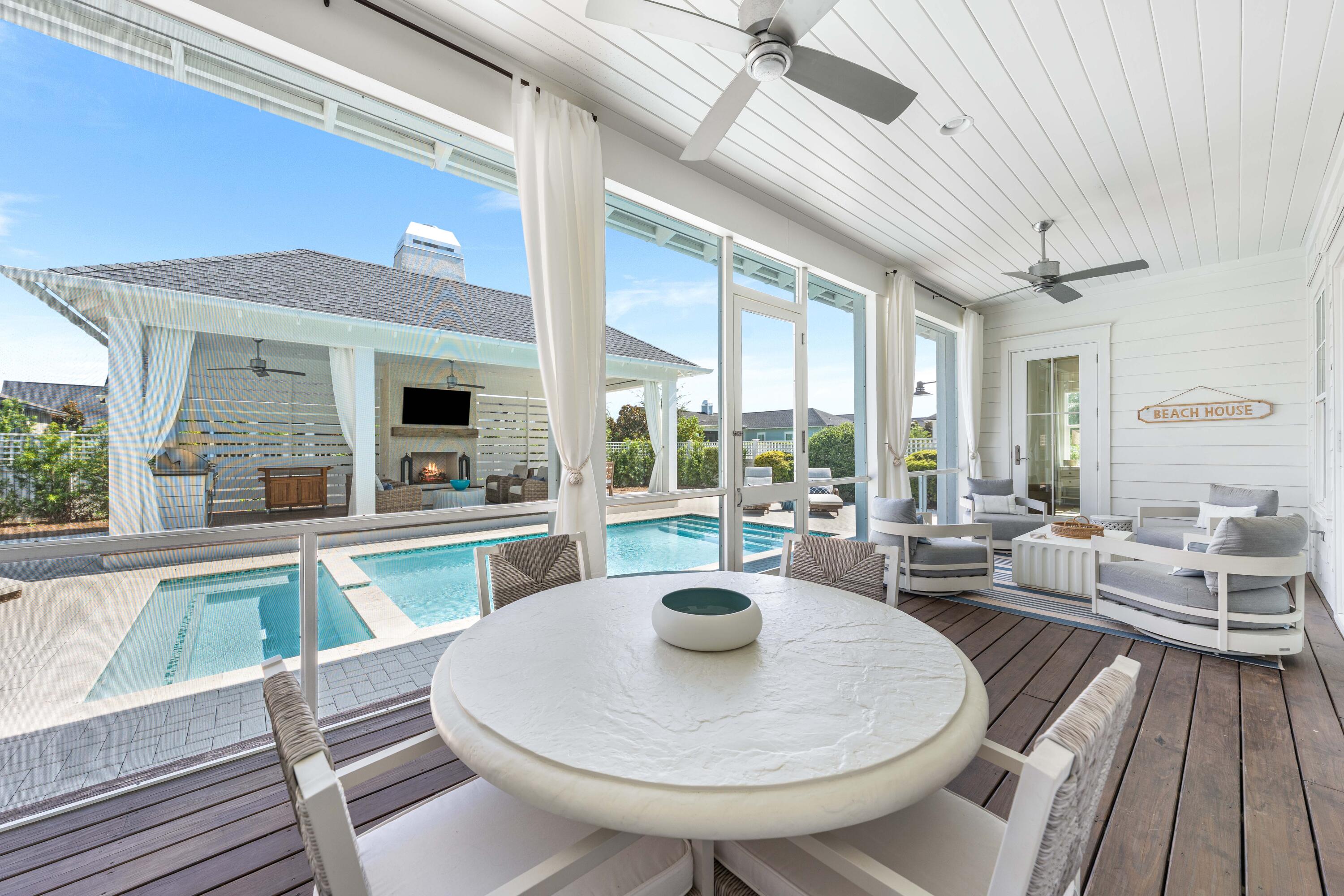 1016 Pathways Dr Inlet Beach Inlet Beach, FL 32461 - Photo 13 of 40 a outdoor dining space with furniture and view of garden