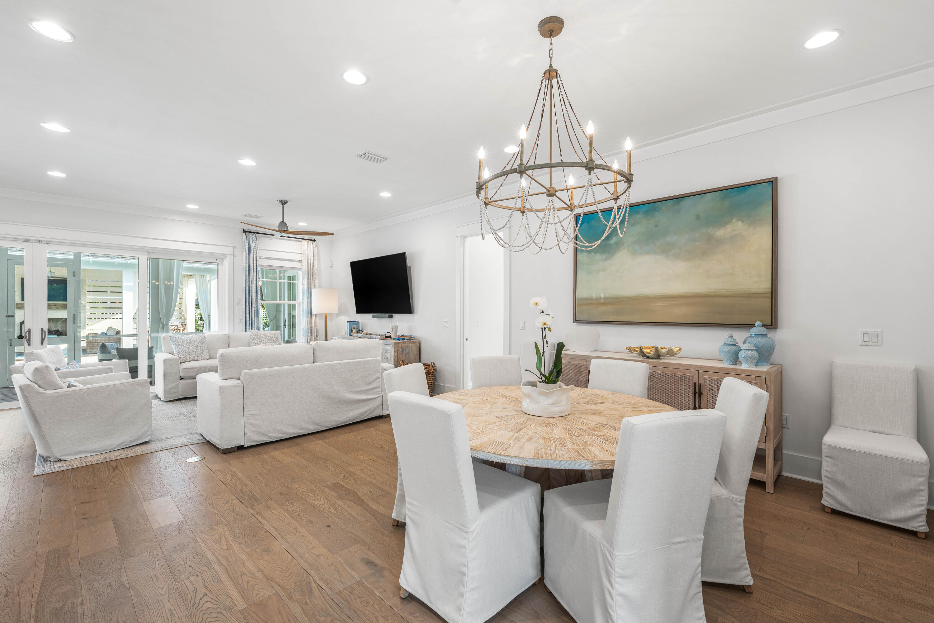 1016 Pathways Dr Inlet Beach Inlet Beach, FL 32461 - Photo 18 of 40 a view of a dining room with furniture wooden floor and chandelier