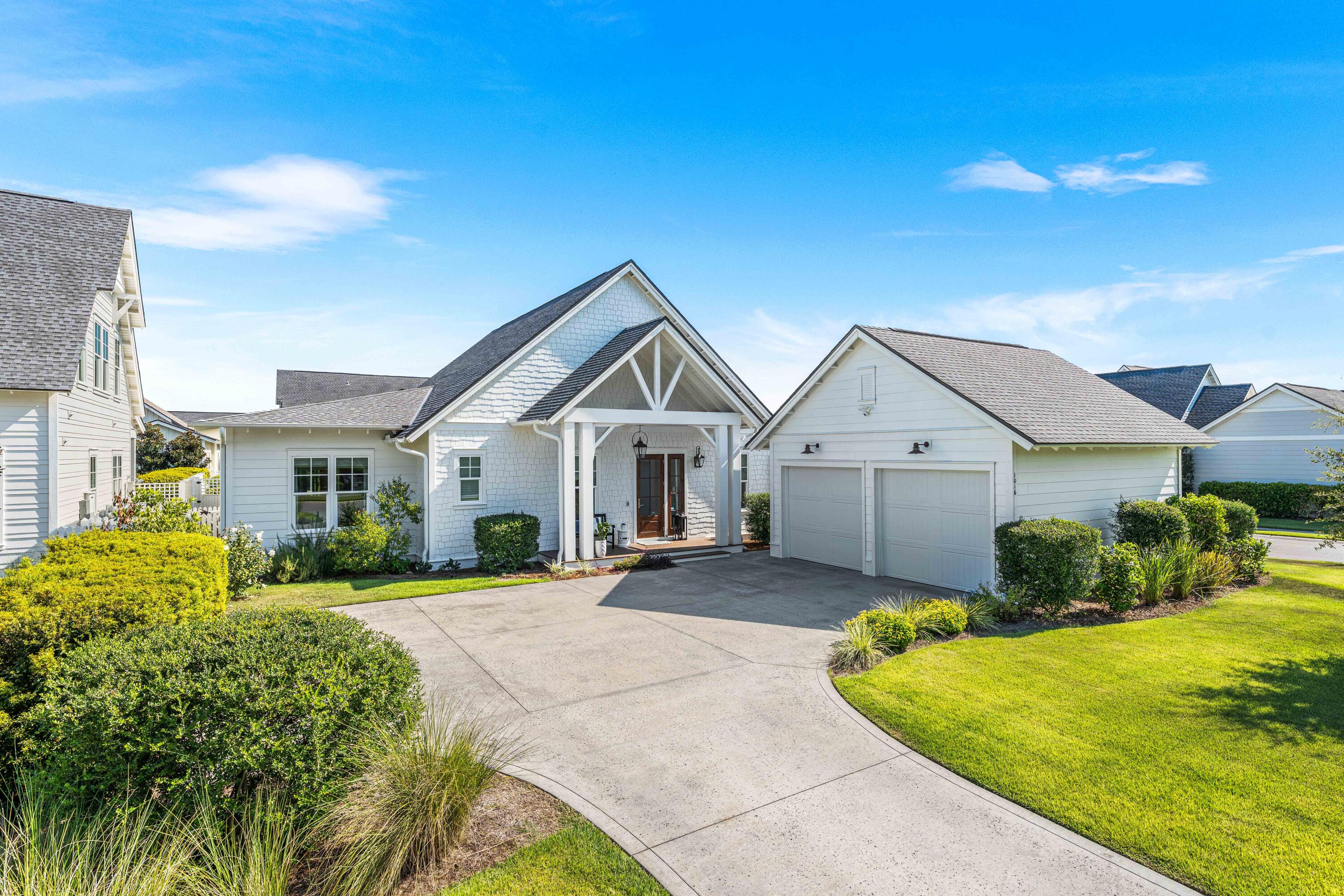 1016 Pathways Dr Inlet Beach Inlet Beach, FL 32461 - Photo 2 of 40 a view of a house next to a big yard