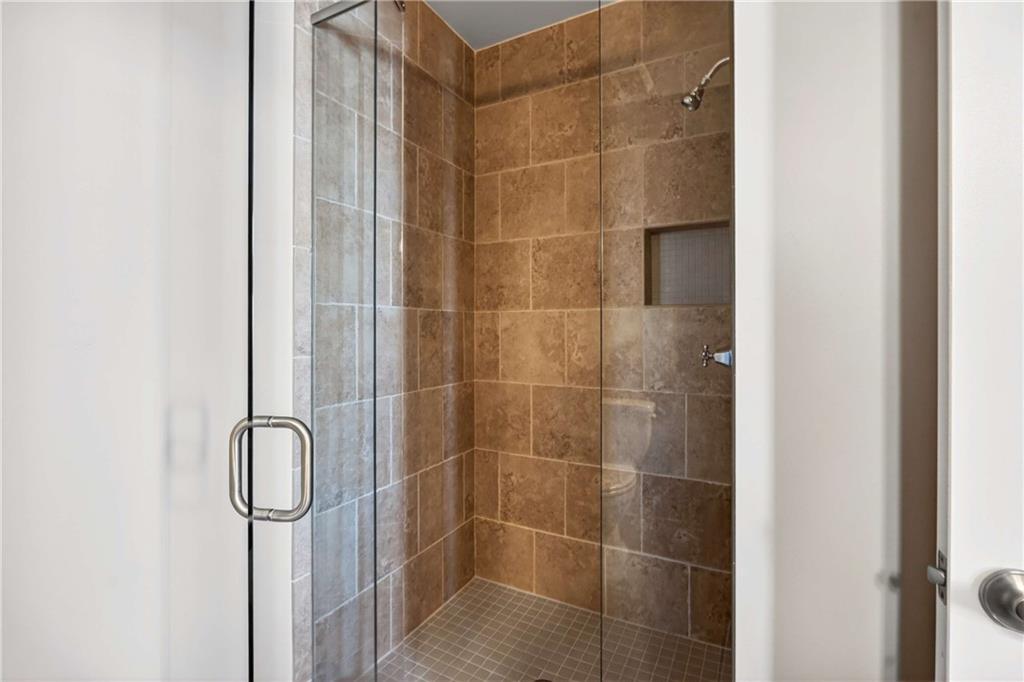201 West Ponce De Leon Avenue, Unit 702 Decatur, GA 30030 - Photo 25 of 41 a bathroom with a shower