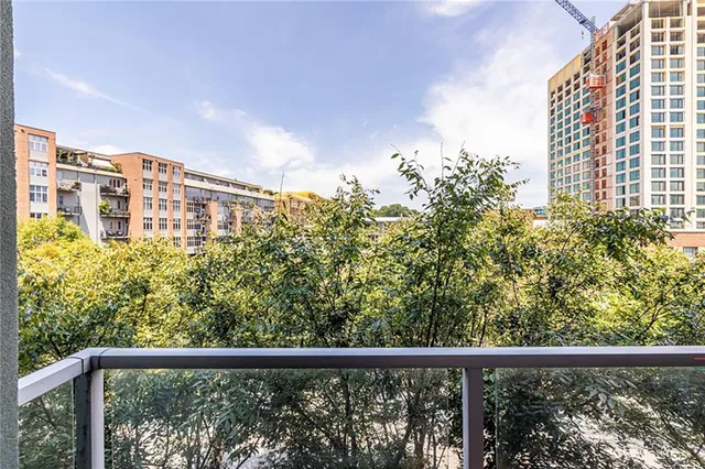 a view of a balcony with an outdoor space