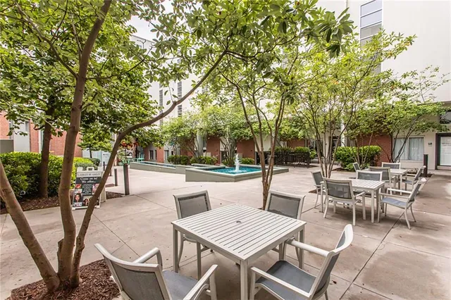 a view of a patio with swimming pool