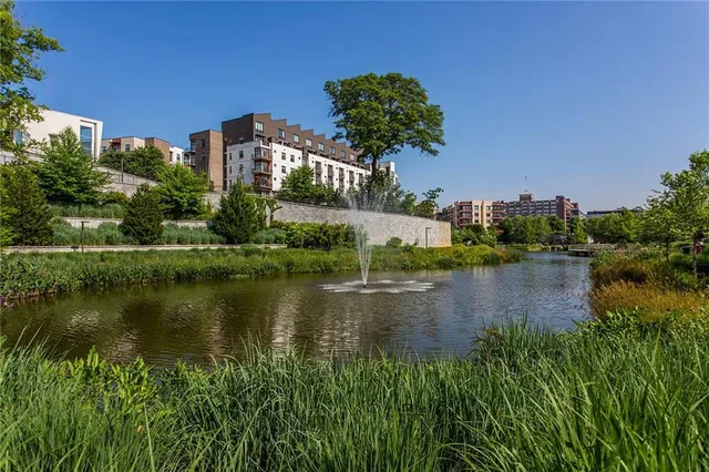 a view of a lake with a building in front of it