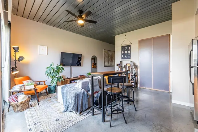 a view of a dining room with furniture