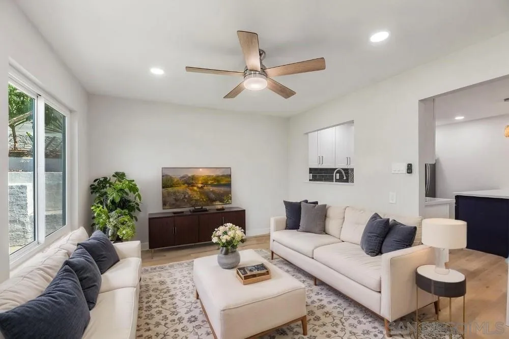 13765 Celestial Road Poway, CA 92064 - Photo 14 of 59 a living room with furniture and a large window