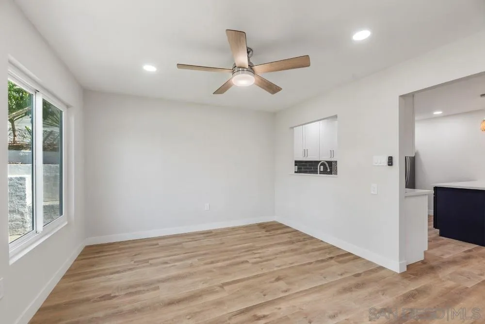 13765 Celestial Road Poway, CA 92064 - Photo 15 of 59 a view of empty room with wooden floor and fan