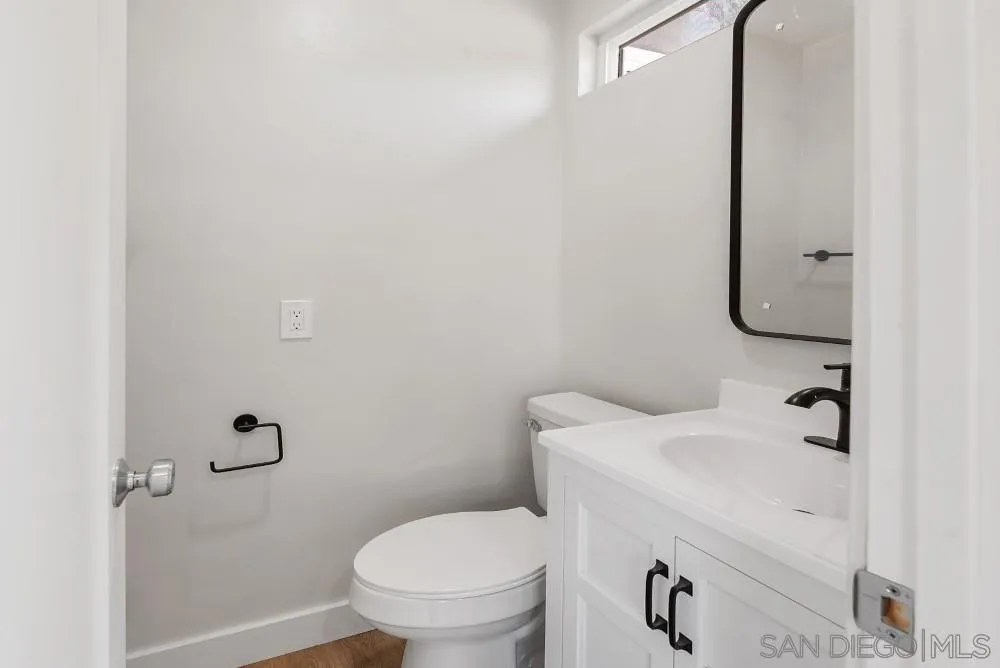 13765 Celestial Road Poway, CA 92064 - Photo 19 of 59 a bathroom with a sink and toilet