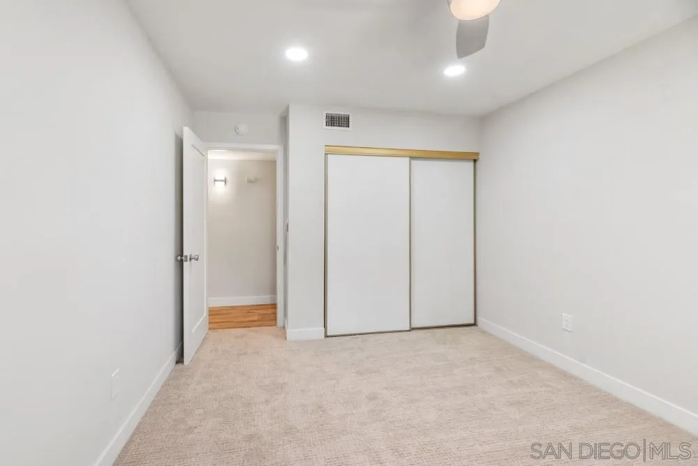 13765 Celestial Road Poway, CA 92064 - Photo 29 of 59 an empty room with closet area