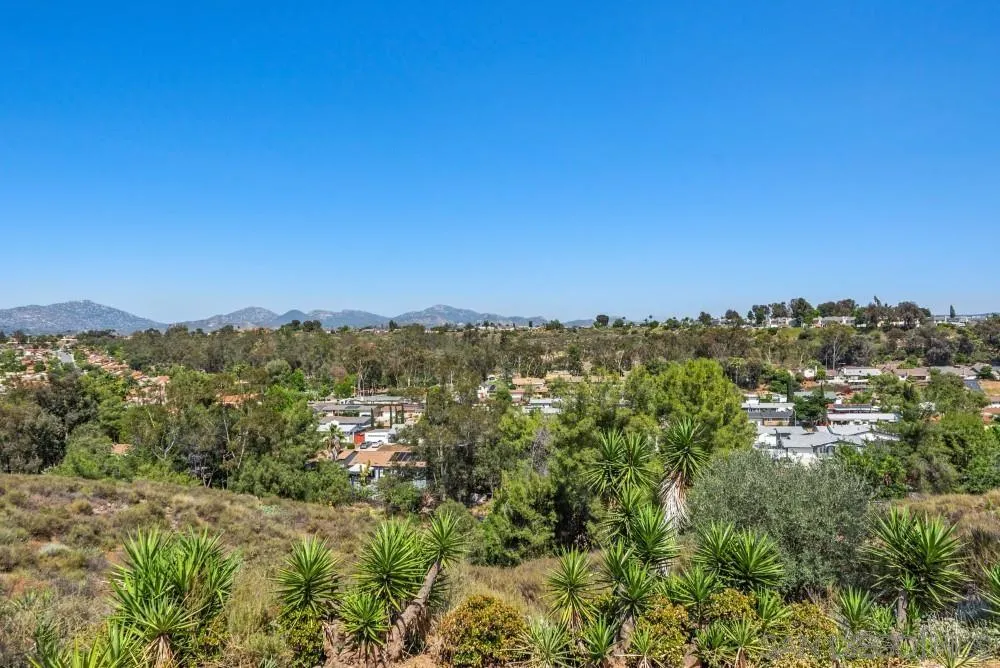 13765 Celestial Road Poway, CA 92064 - Photo 43 of 59 a view of a city with lush green forest