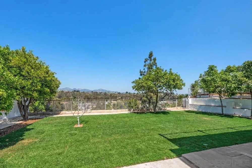 13765 Celestial Road Poway, CA 92064 - Photo 48 of 59 a view of a garden with a tree in it