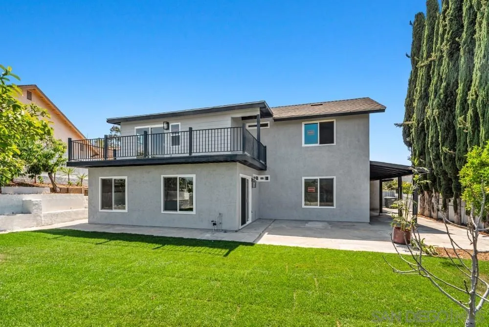 13765 Celestial Road Poway, CA 92064 - Photo 50 of 59 a view of a house with a backyard
