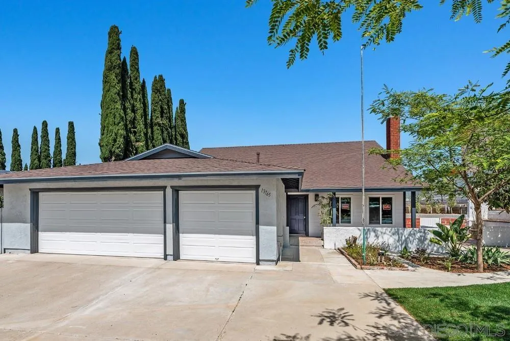 13765 Celestial Road Poway, CA 92064 - Photo 51 of 59 front view of a house with a yard
