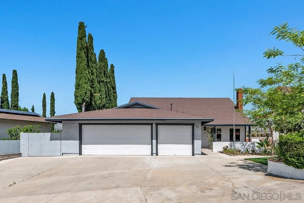 13765 Celestial Road Poway, CA 92064 - Photo 52 of 59 a view of a house with a yard and potted plants