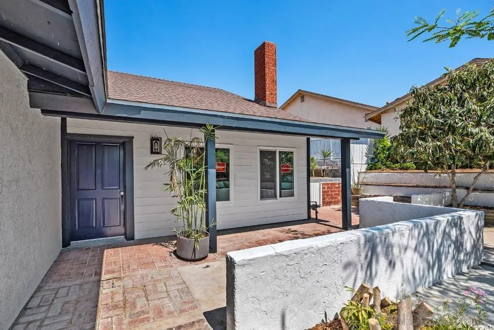 13765 Celestial Road Poway, CA 92064 - Photo 53 of 59 a front view of a house with garden