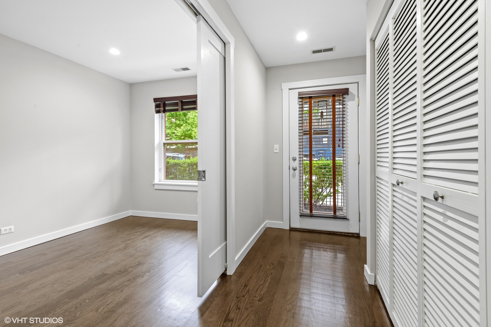18 South Aberdeen Street, Unit 2 Chicago, IL 60607 - Photo 11 of 26 wooden floor in an empty room with a window