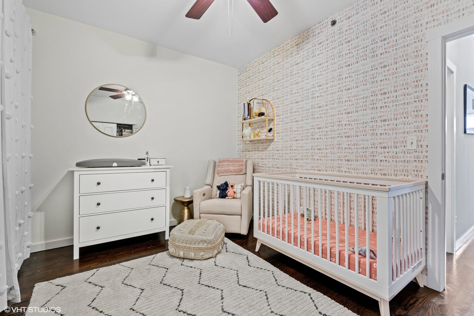 18 South Aberdeen Street, Unit 2 Chicago, IL 60607 - Photo 16 of 26 a bedroom with a baby bed baby crib and a dresser