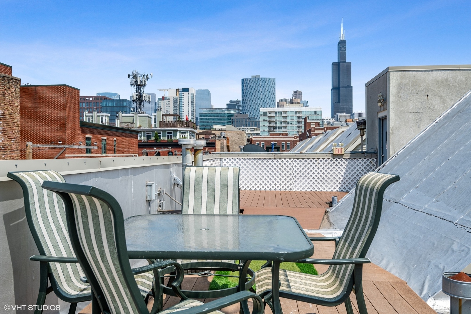18 South Aberdeen Street, Unit 2 Chicago, IL 60607 - Photo 22 of 26 a view of city from balcony with furniture