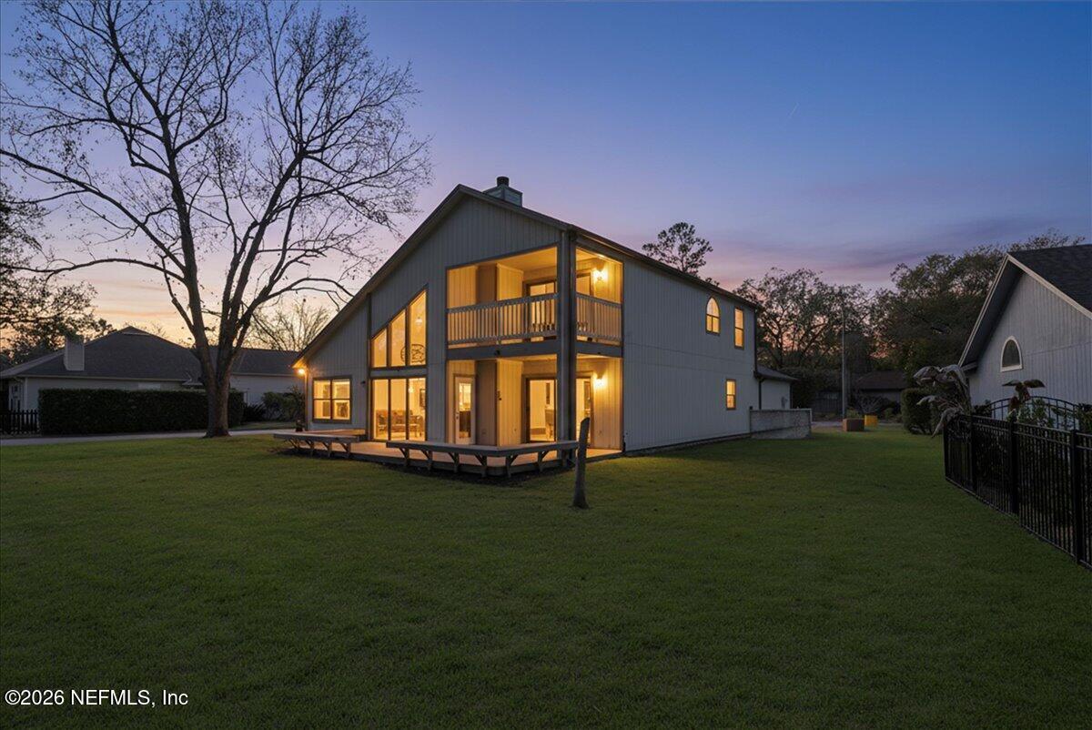 13075 Seedling Way Jacksonville, FL 32246 - Photo 28 of 48 a view of a house with a yard