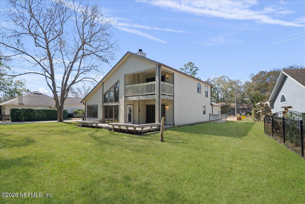13075 Seedling Way Jacksonville, FL 32246 - Photo 29 of 48 a front view of a house with a yard