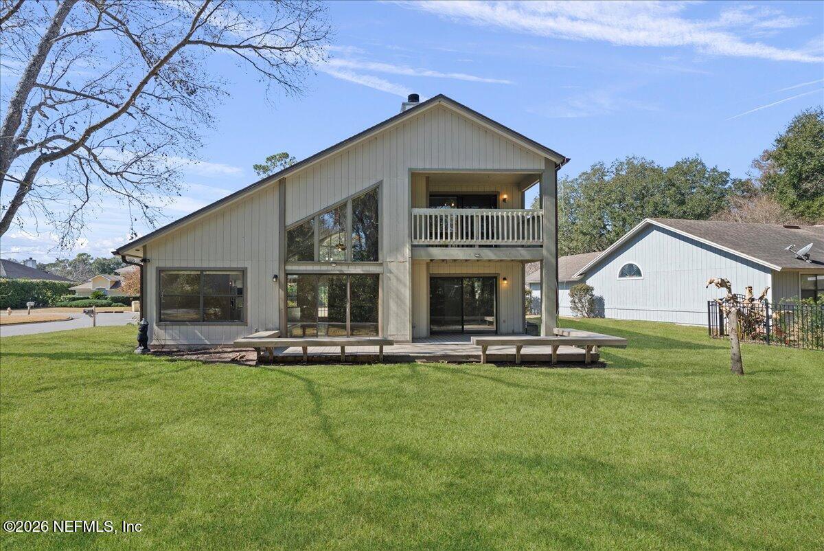 13075 Seedling Way Jacksonville, FL 32246 - Photo 31 of 48 a view of a house with a yard and sitting area