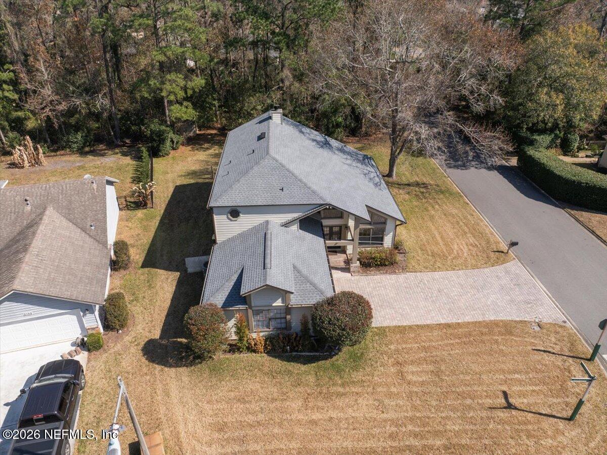 13075 Seedling Way Jacksonville, FL 32246 - Photo 33 of 48 an aerial view of a house with a yard