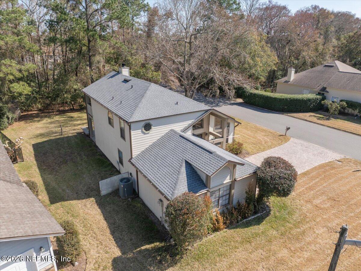 13075 Seedling Way Jacksonville, FL 32246 - Photo 34 of 48 a view of a house with a yard
