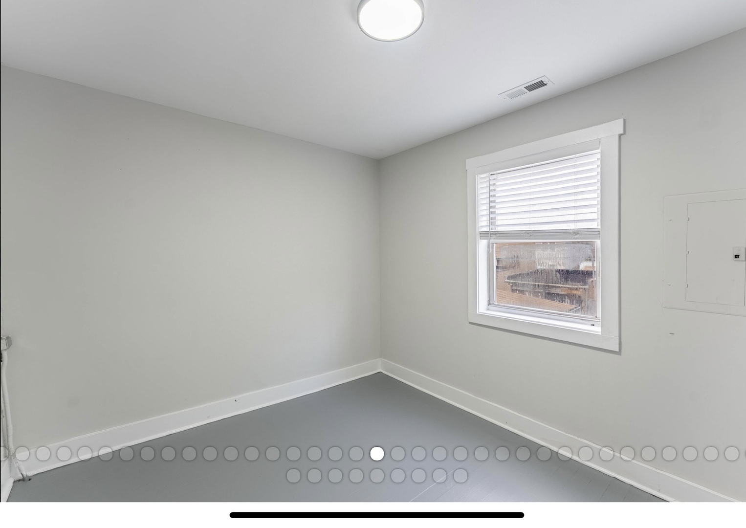 6241 South Troy Street, Unit 2 Chicago, IL 60629 - Photo 15 of 17 an empty room with windows