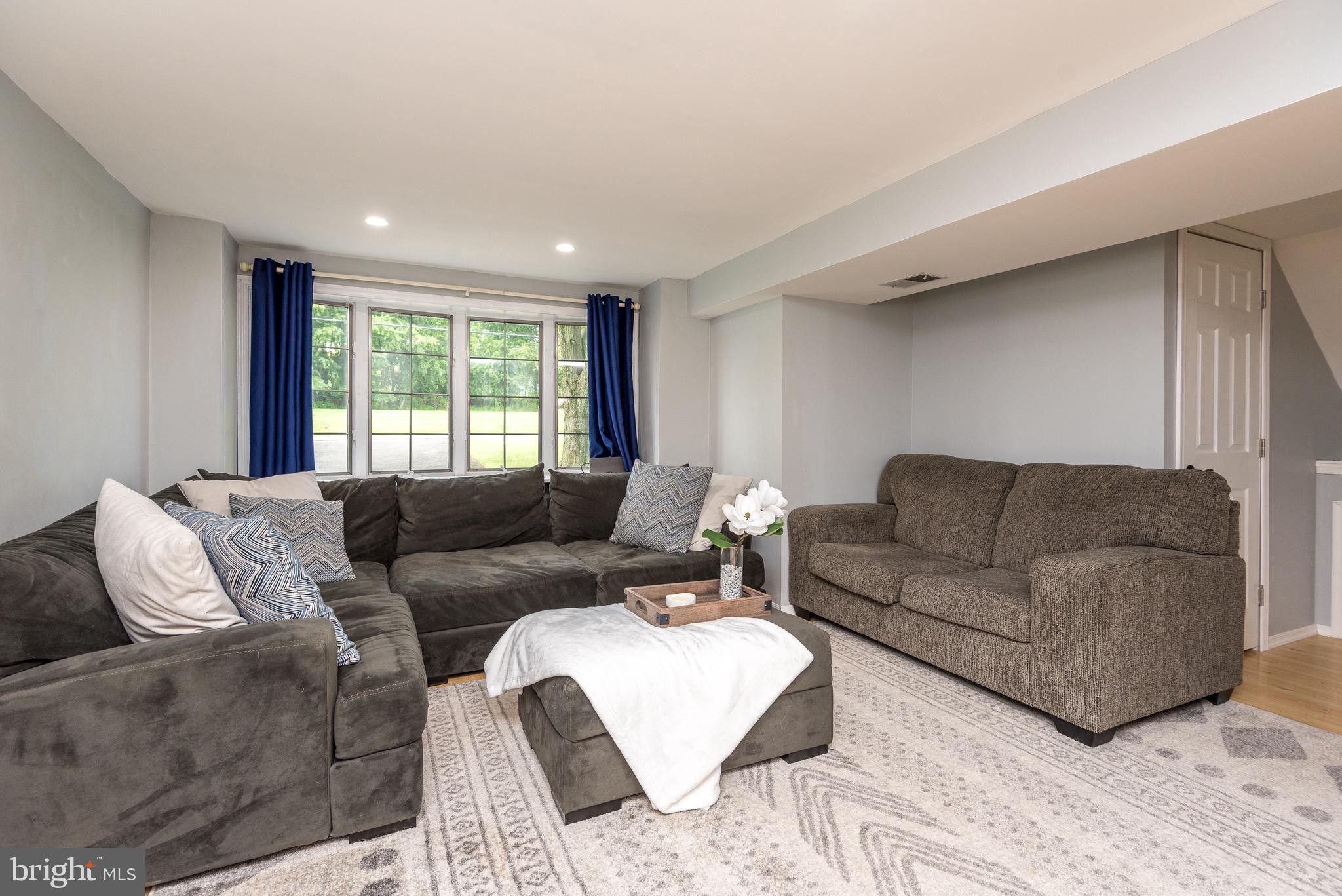 387 South Norristown Road Warminster, PA 18974 - Photo 23 of 39 lower level family room w fireplace