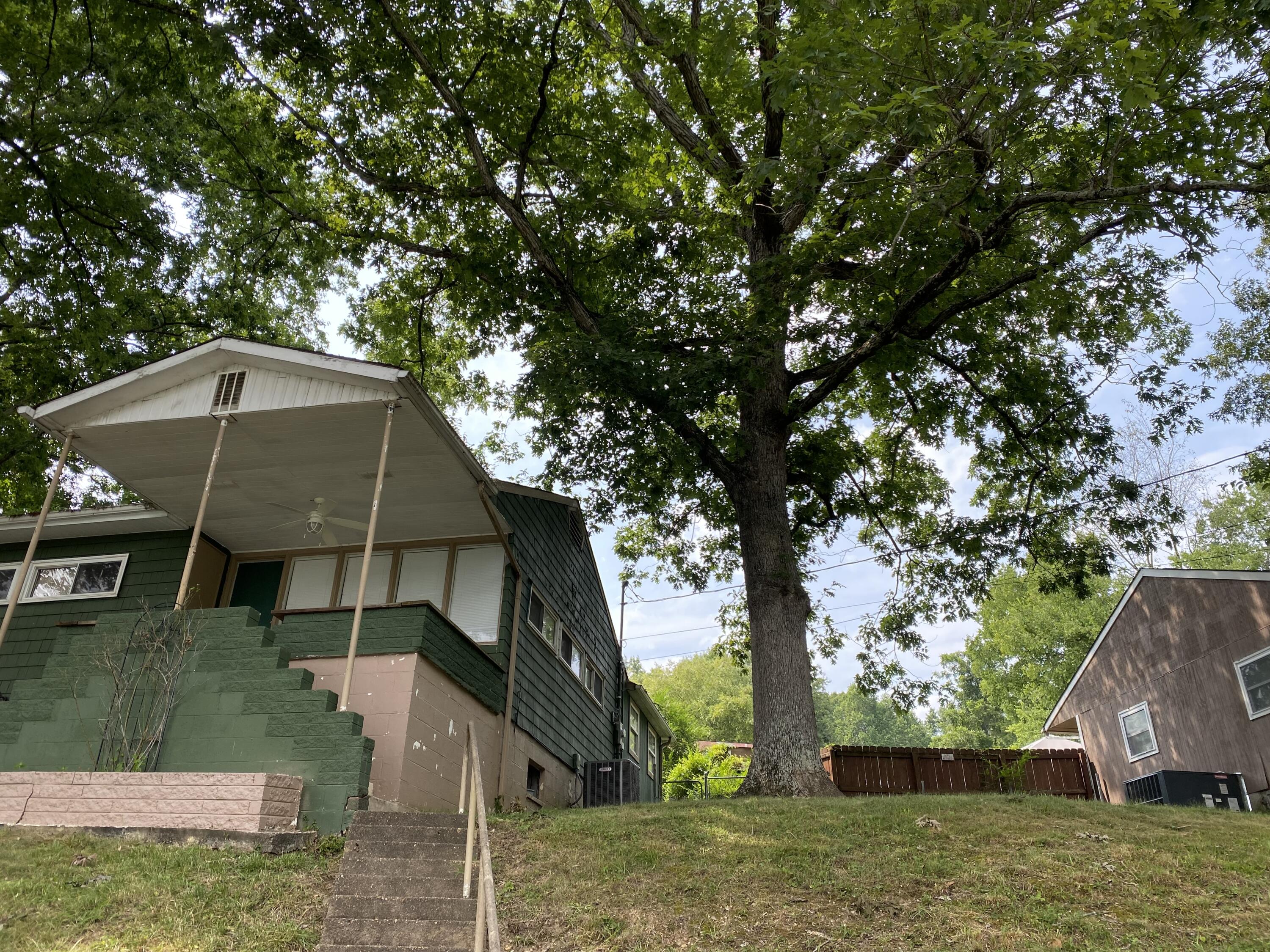 141 Johnson Road Oak Ridge, TN 37830 - Photo 1 of 12 Johnson front and side