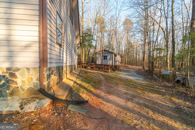 a bathroom with a sink a mirror and a shower