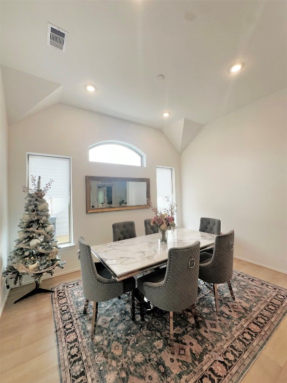 4918 Mango Pk Lane Manvel, TX 77578 - Photo 14 of 28 a view of a dining room with furniture and wooden floor