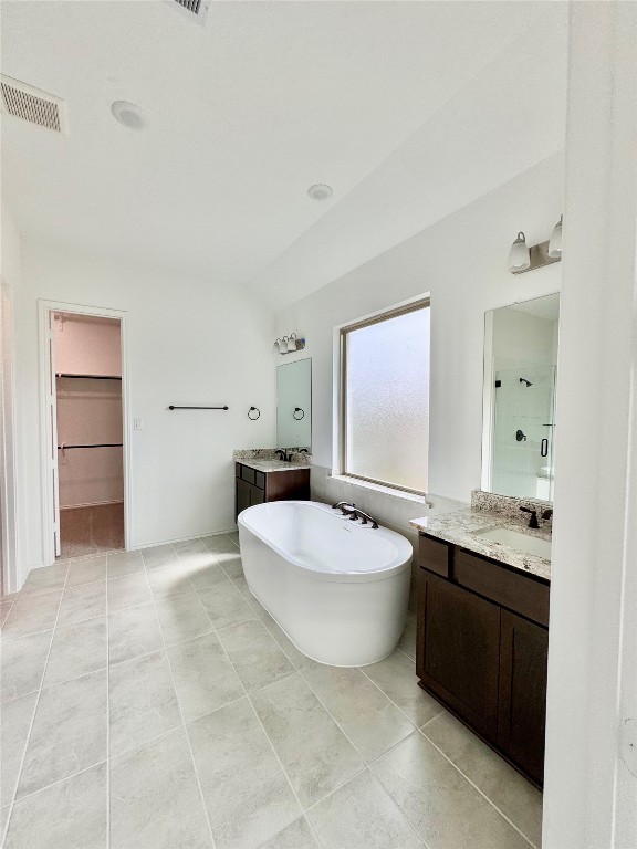 4918 Mango Pk Lane Manvel, TX 77578 - Photo 16 of 28 a bathroom with a sink a toilet and shower