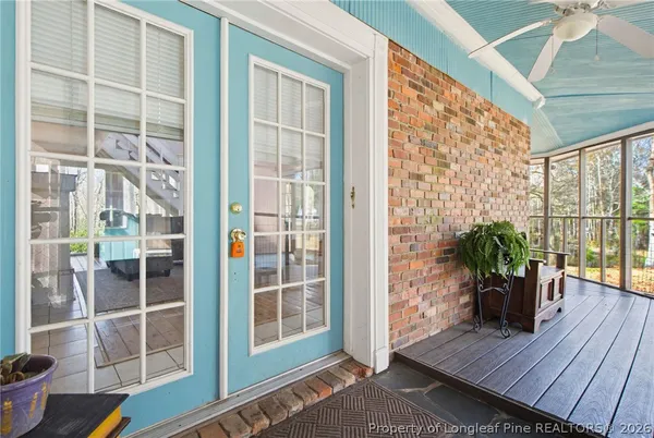 a view of balcony with wooden floor and outdoor space