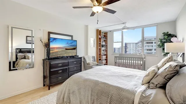 a view of a hallway with wooden shelves