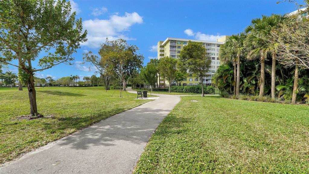 4400 Hillcrest Drive, Unit 719C Hollywood, FL 33021 - Photo 39 of 39 a view of a park with large trees