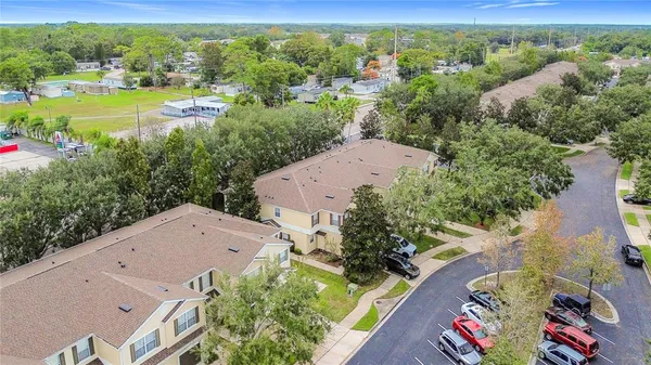 an aerial view of a house with a garden