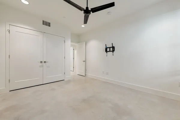 a view of a backyard with large trees