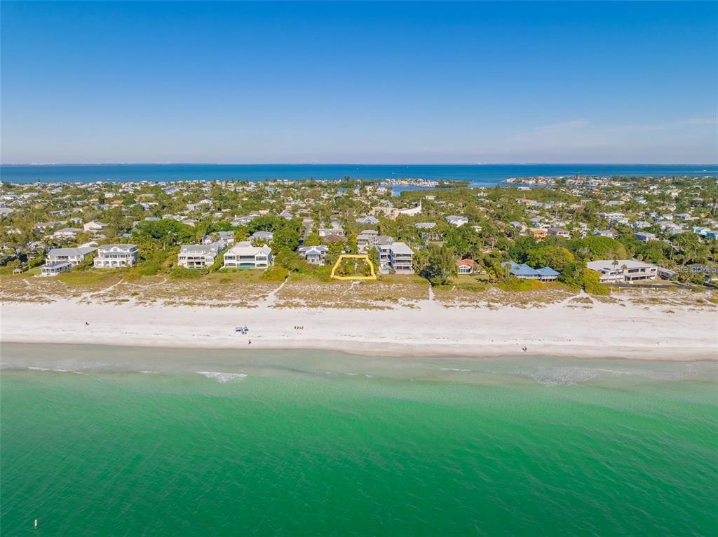 102 Sunset Lane Holmes Beach, FL 34217 - Photo 6 of 14 a view of an ocean and beach