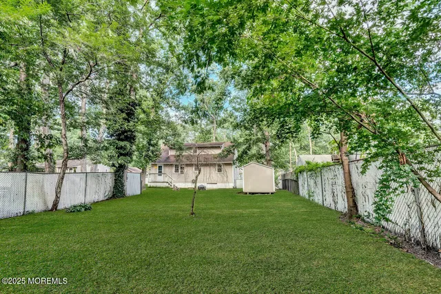 a view of a backyard with a garden