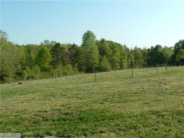 2254 Cullen Road Gibsonville, NC 27249 - Photo 10 of 16 Land/Lot. Large round riding ring at back of property near barn