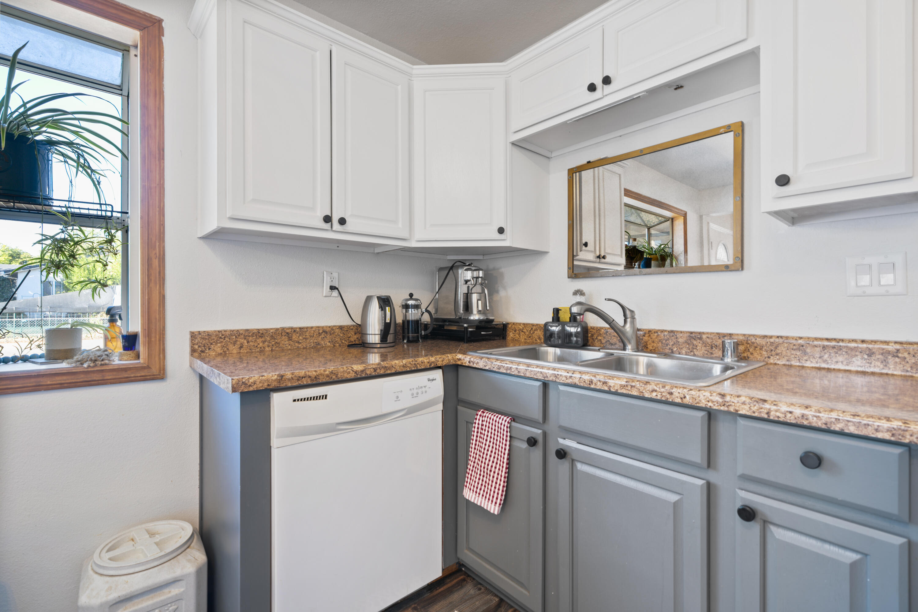 2041 Jupiter Terrace Redding, CA 96002 - Photo 13 of 32 a kitchen with stainless steel appliances granite countertop a sink stove and cabinets