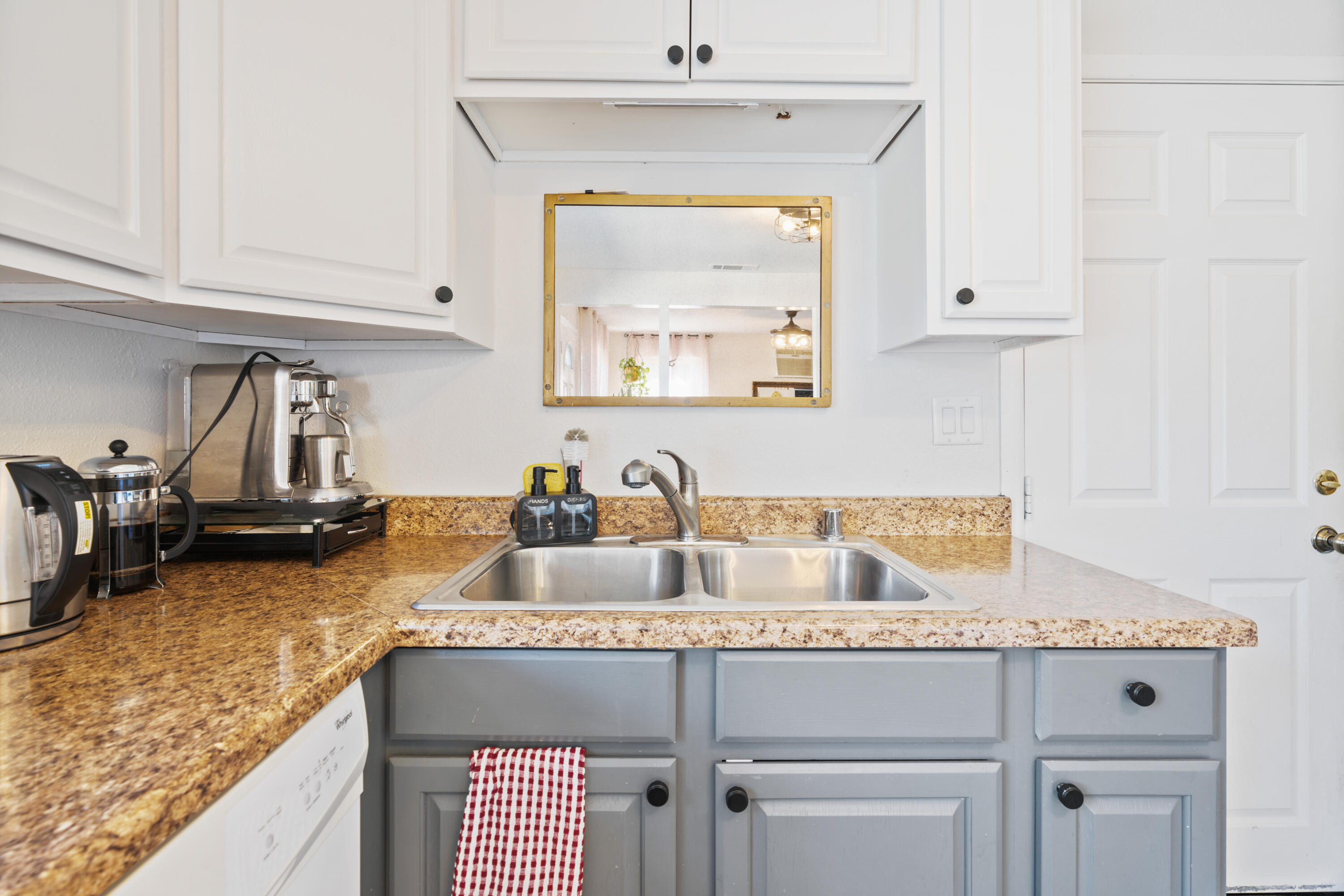 2041 Jupiter Terrace Redding, CA 96002 - Photo 14 of 32 a kitchen with sink cabinets and stove