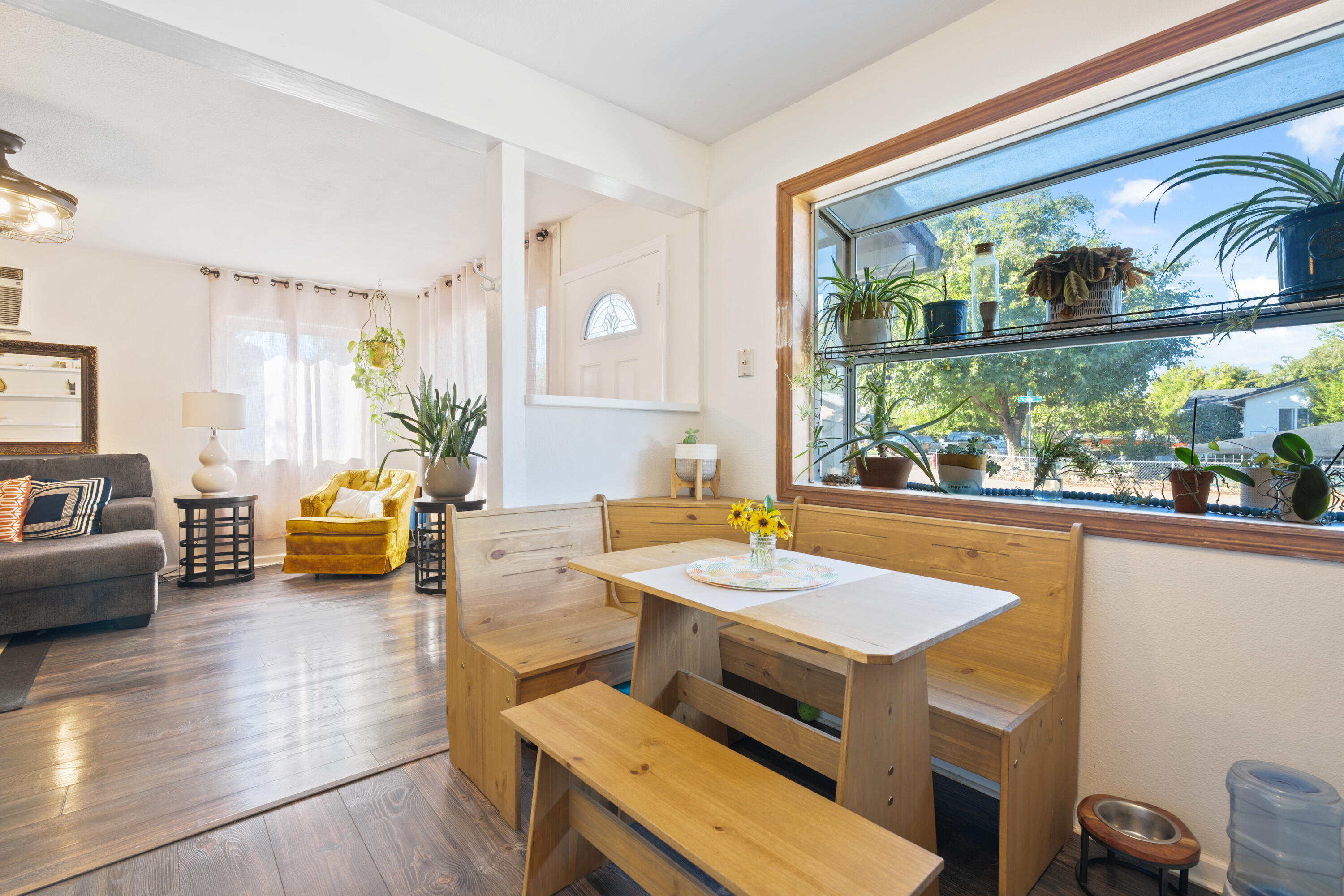 2041 Jupiter Terrace Redding, CA 96002 - Photo 15 of 32 a view of a dining room with furniture a chandelier and wooden floor