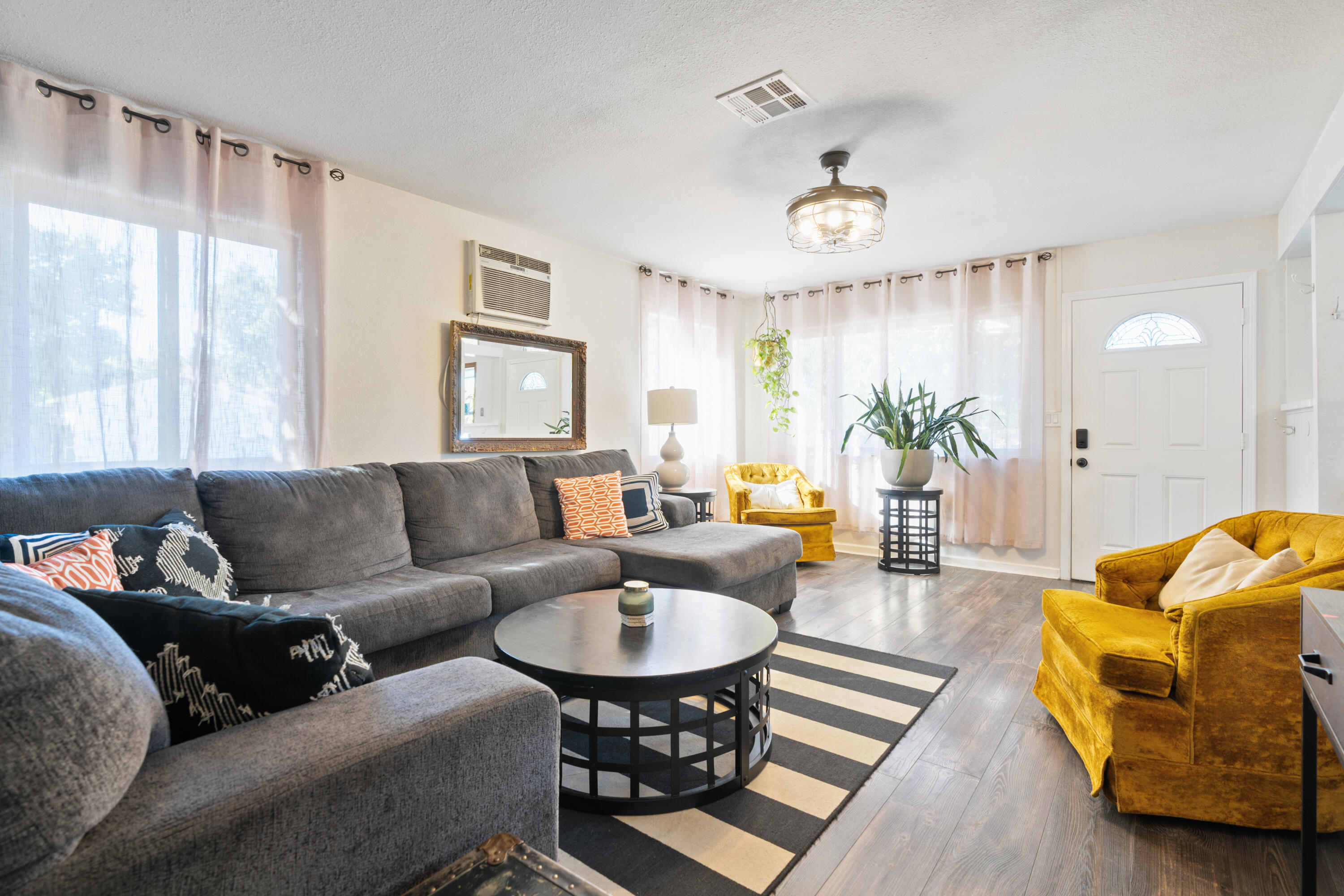 2041 Jupiter Terrace Redding, CA 96002 - Photo 17 of 32 a living room with furniture and a large window