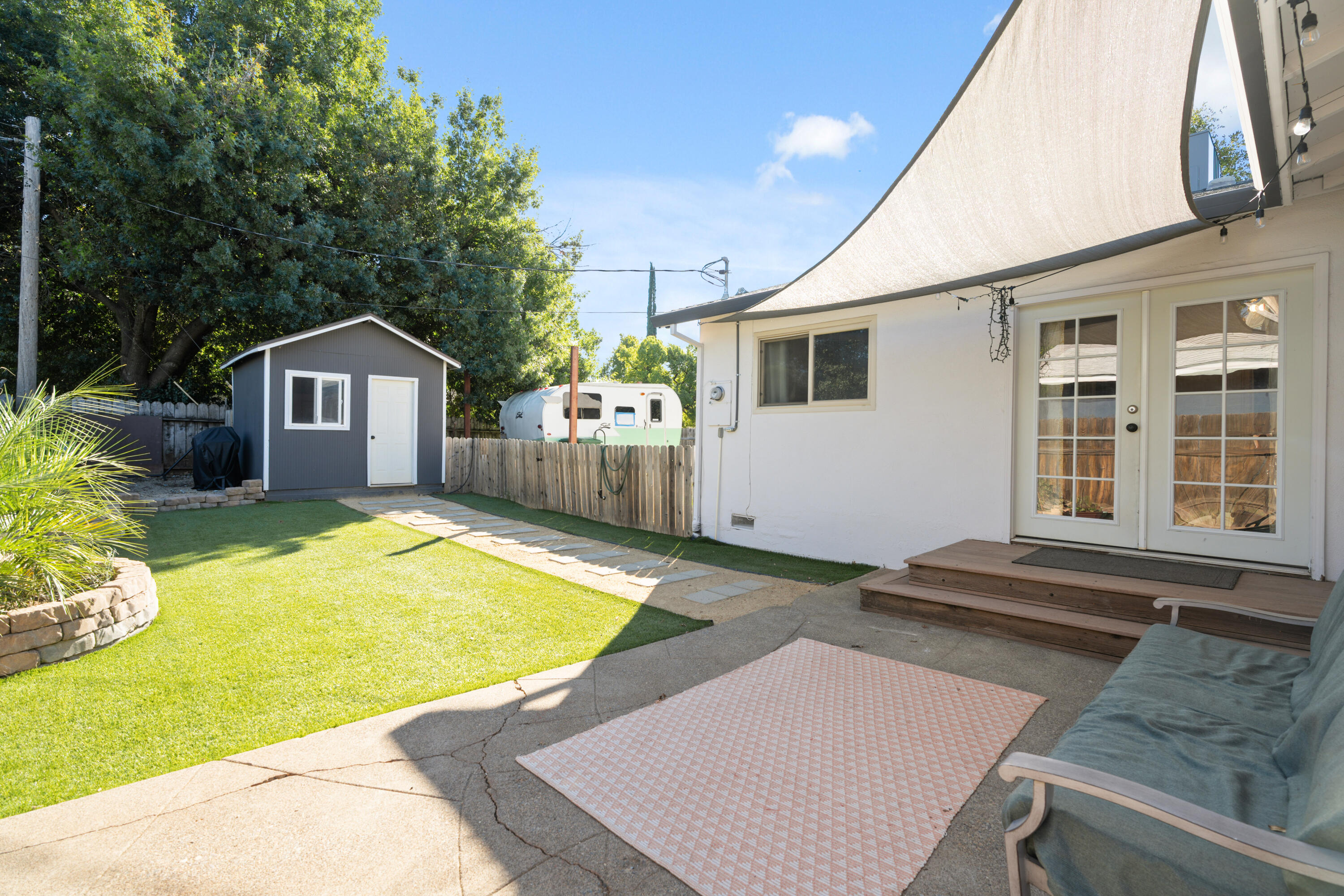 2041 Jupiter Terrace Redding, CA 96002 - Photo 20 of 32 a swimming pool with yard and outdoor seating