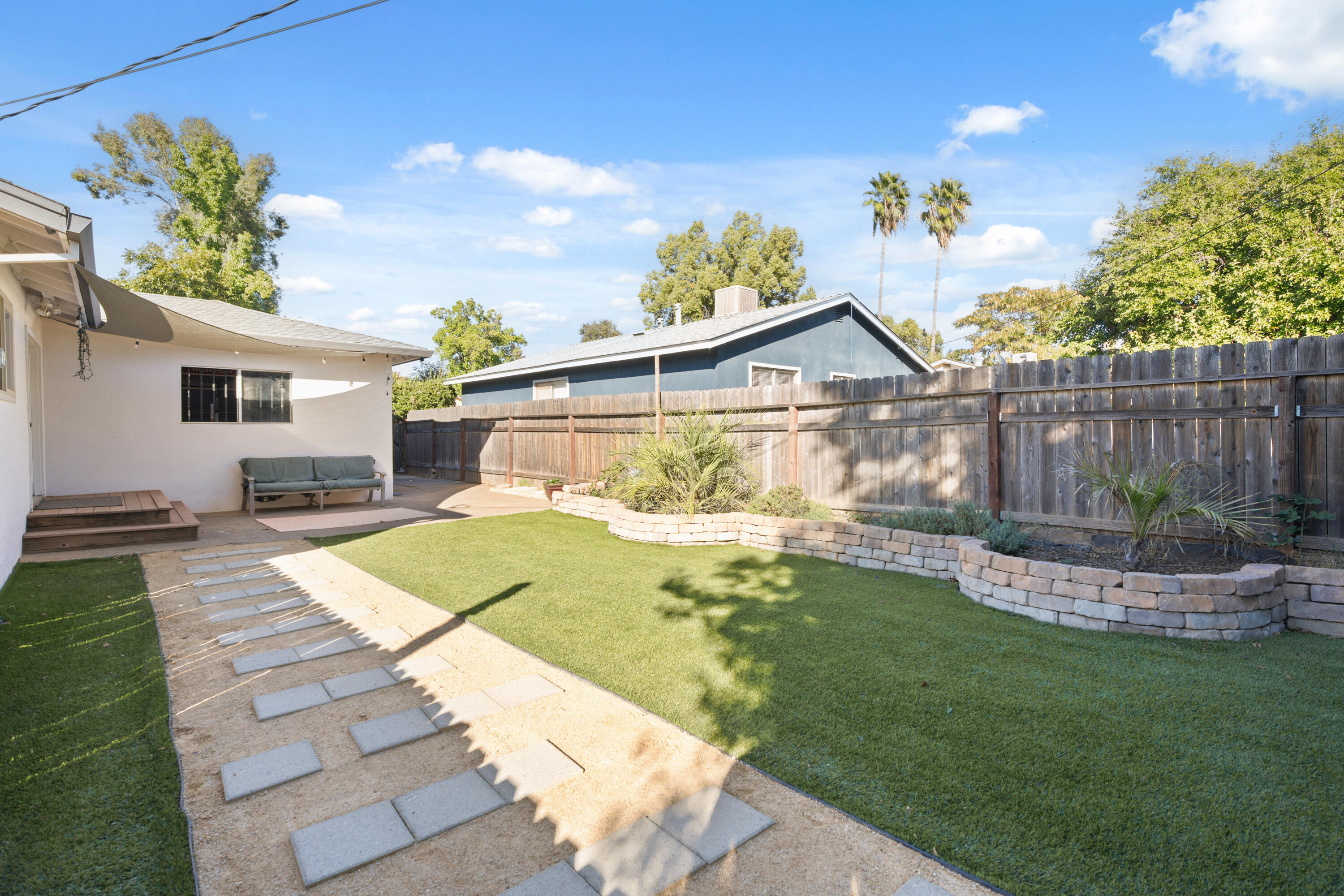 2041 Jupiter Terrace Redding, CA 96002 - Photo 21 of 32 a view of a house with a backyard